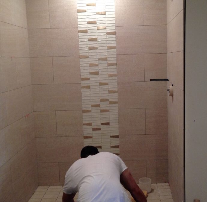 Tile installer in shower